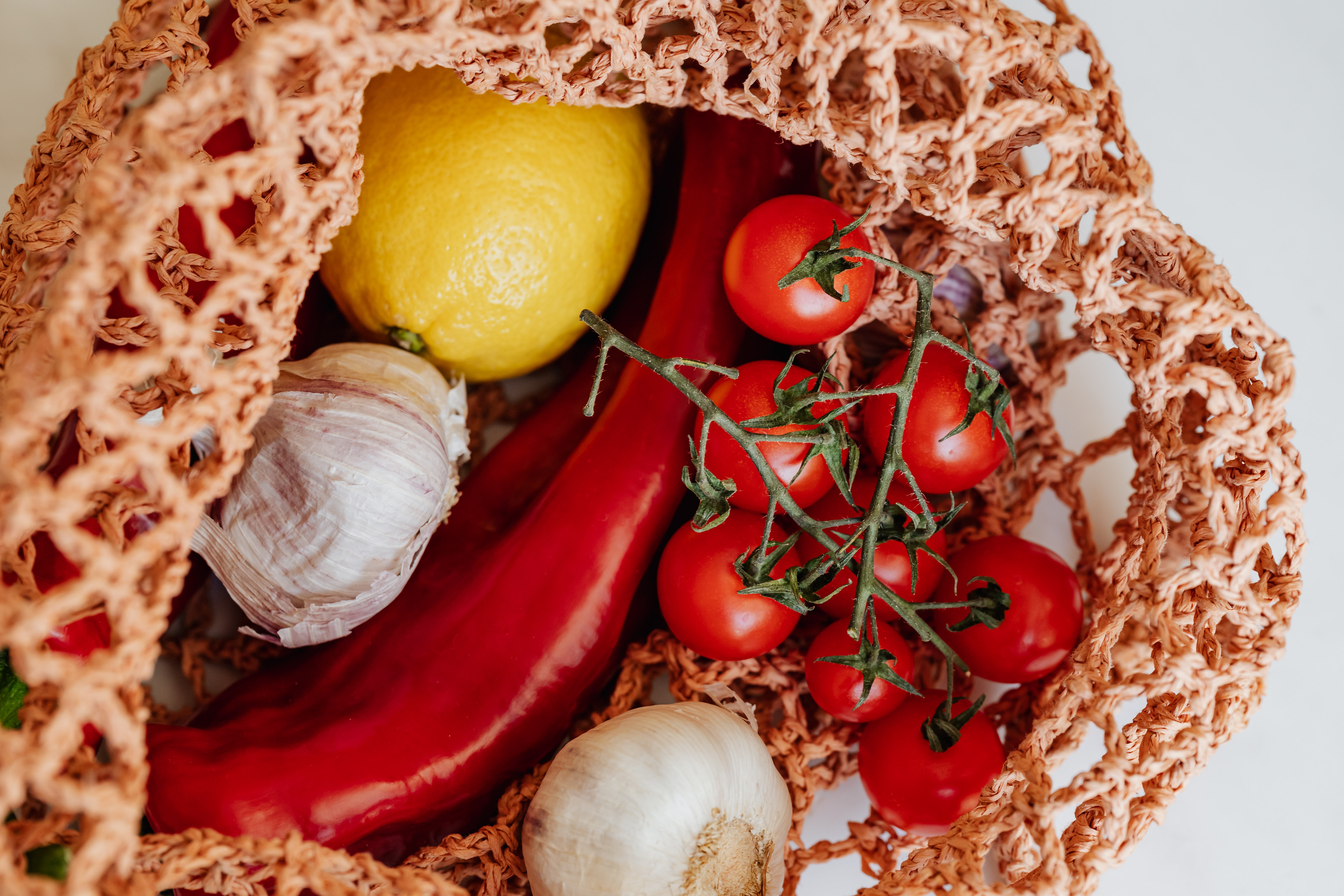 colorful groceries in netted bag